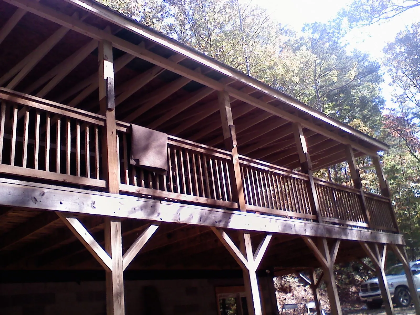 Timber framing under a new elevated porch and deck — Roof Leak Repair in Mashpee by Roofing Brothers